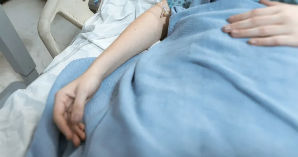 Hospital patient in a bed