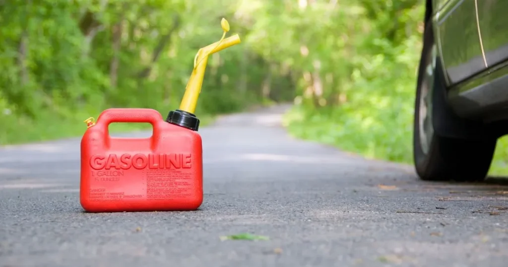 Gas can next to a car