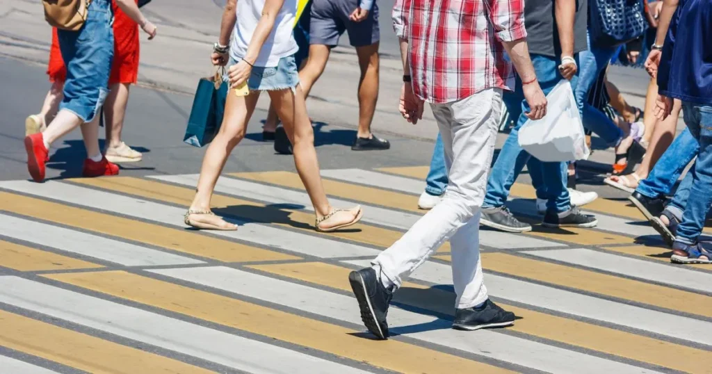 pedestrians crossing a cross-walk.
