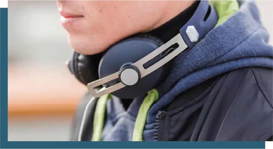 Customer support representative with headset for professional communication.