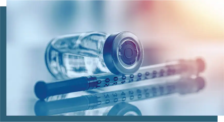 Vaccine vial and syringe for immunization and healthcare.