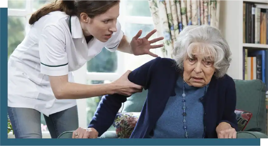 Caregiver helping elderly woman in a home setting for senior care.