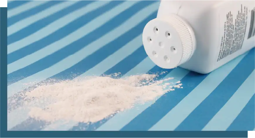 Pain relief powder spilled on blue striped surface with pill bottle.